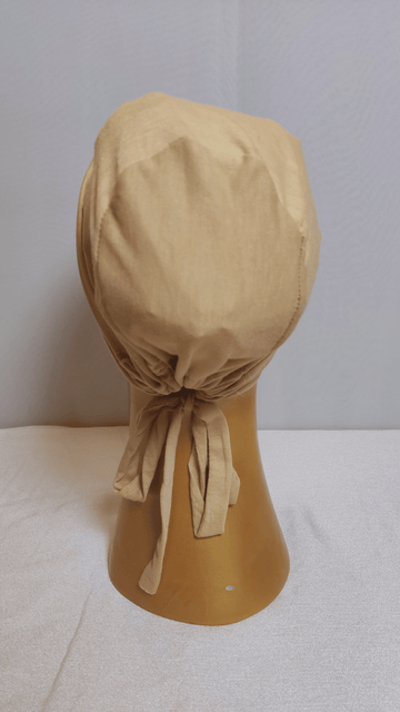 Full Coverage Tie-back Cap